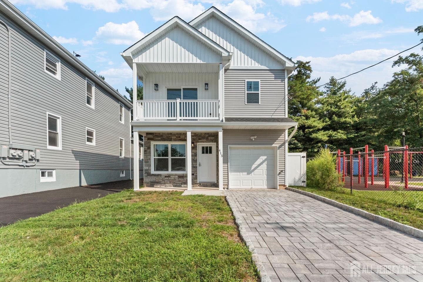 Home built by Rose Homes at 415 E 9TH AVE